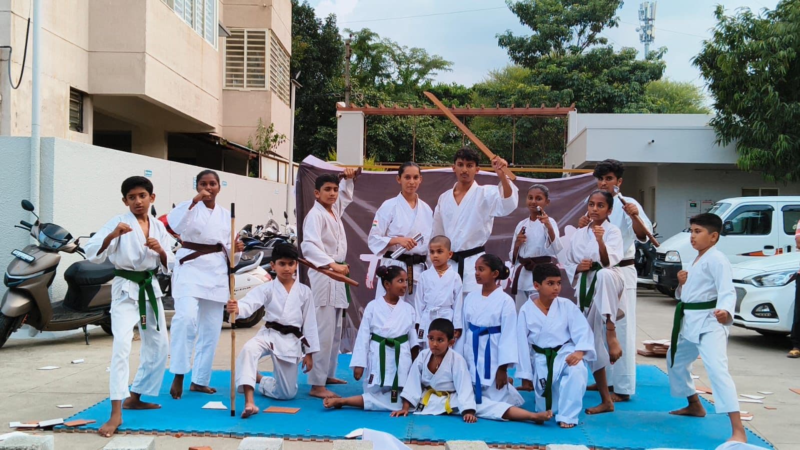 Team Pose with Weapons — Demo Day